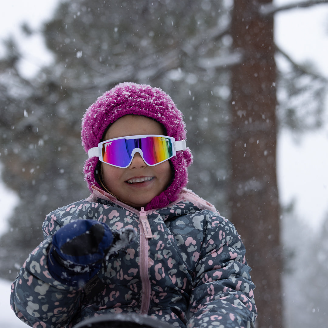 / Pink | Baby in the snow wearing The Miami Nights Baby Vipes from Pit Viper Sunglasses