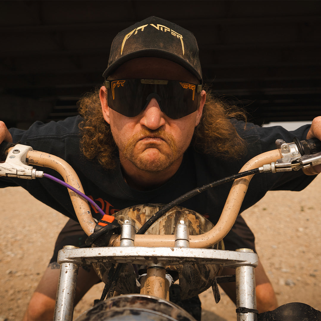 Wide / Smoke | Man on a motorcycle wearing The Big Buck Hunter Original Wide from Pit Viper Sunglasses