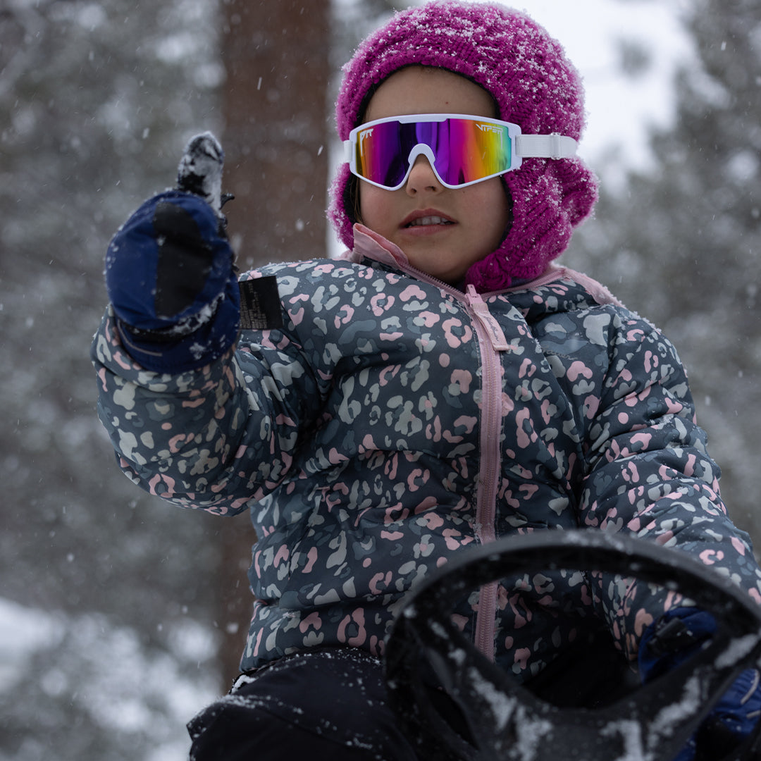 / Pink | Baby in the snow wearing The Miami Nights Baby Vipes from Pit Viper Sunglasses