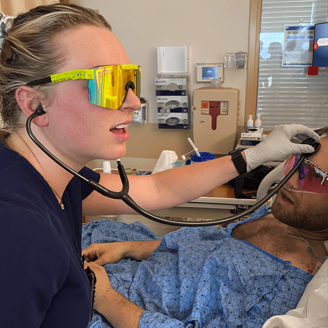 Narrow / Polarized Rainbow  | Nurse wearing The 1993 Original from Pit Viper Sunglasses