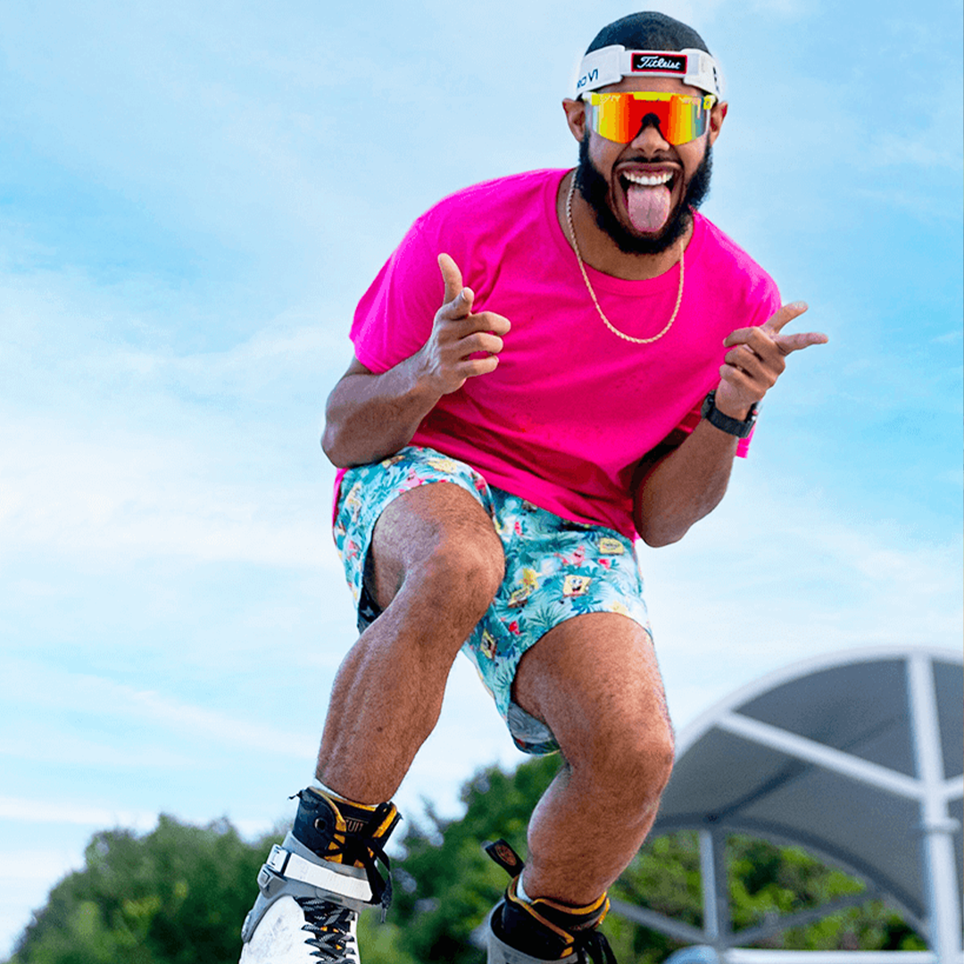 Narrow / Polarized Rainbow  | Man posing wearing The 1993 Original from Pit Viper Sunglasses