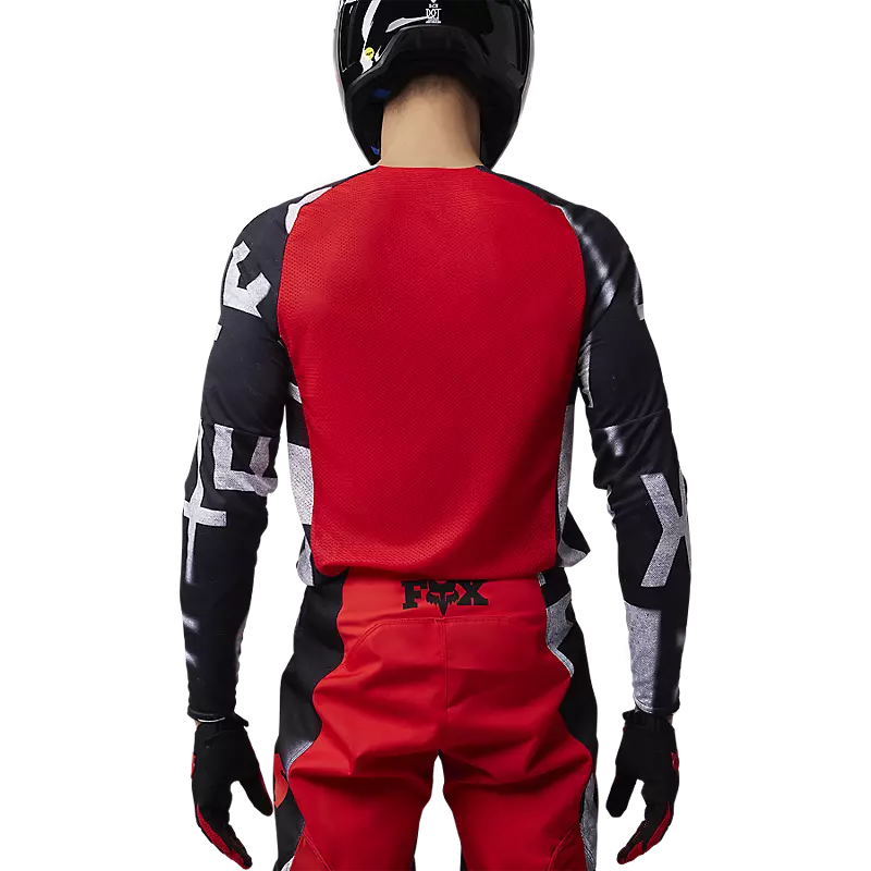 360 SEVENTY4 JERSEY featuring a modern design and vibrant colors, displayed on a mannequin against a neutral background.