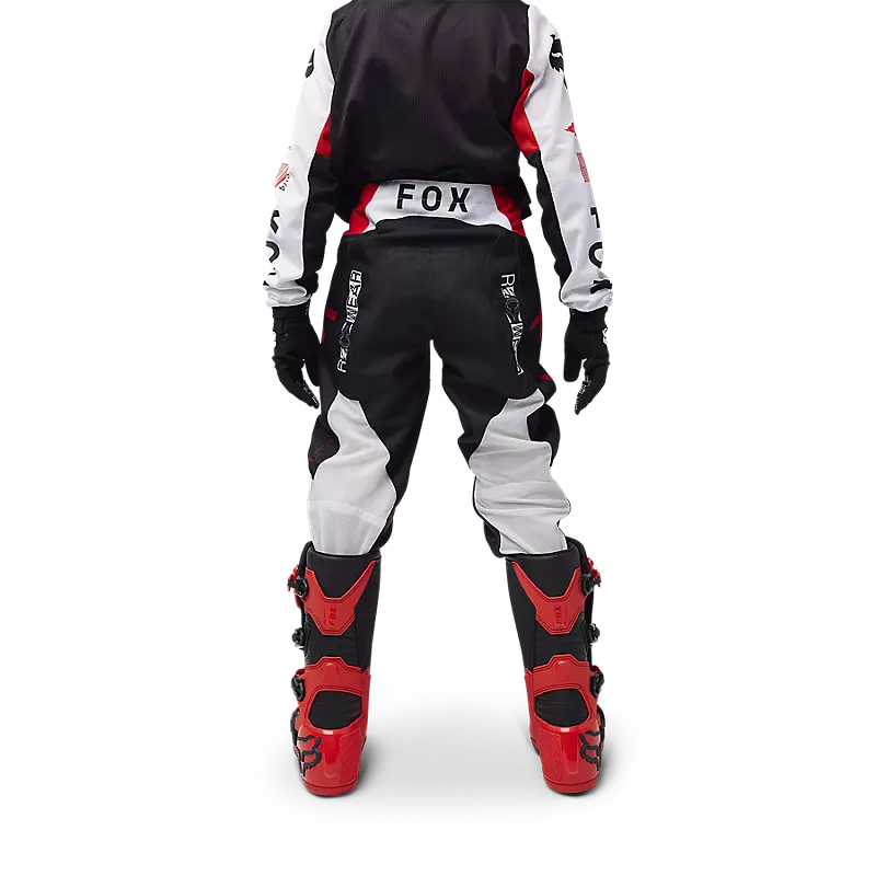 YTH 180 RACE SPEC PANT in black and red, featuring a durable design for young motocross riders.