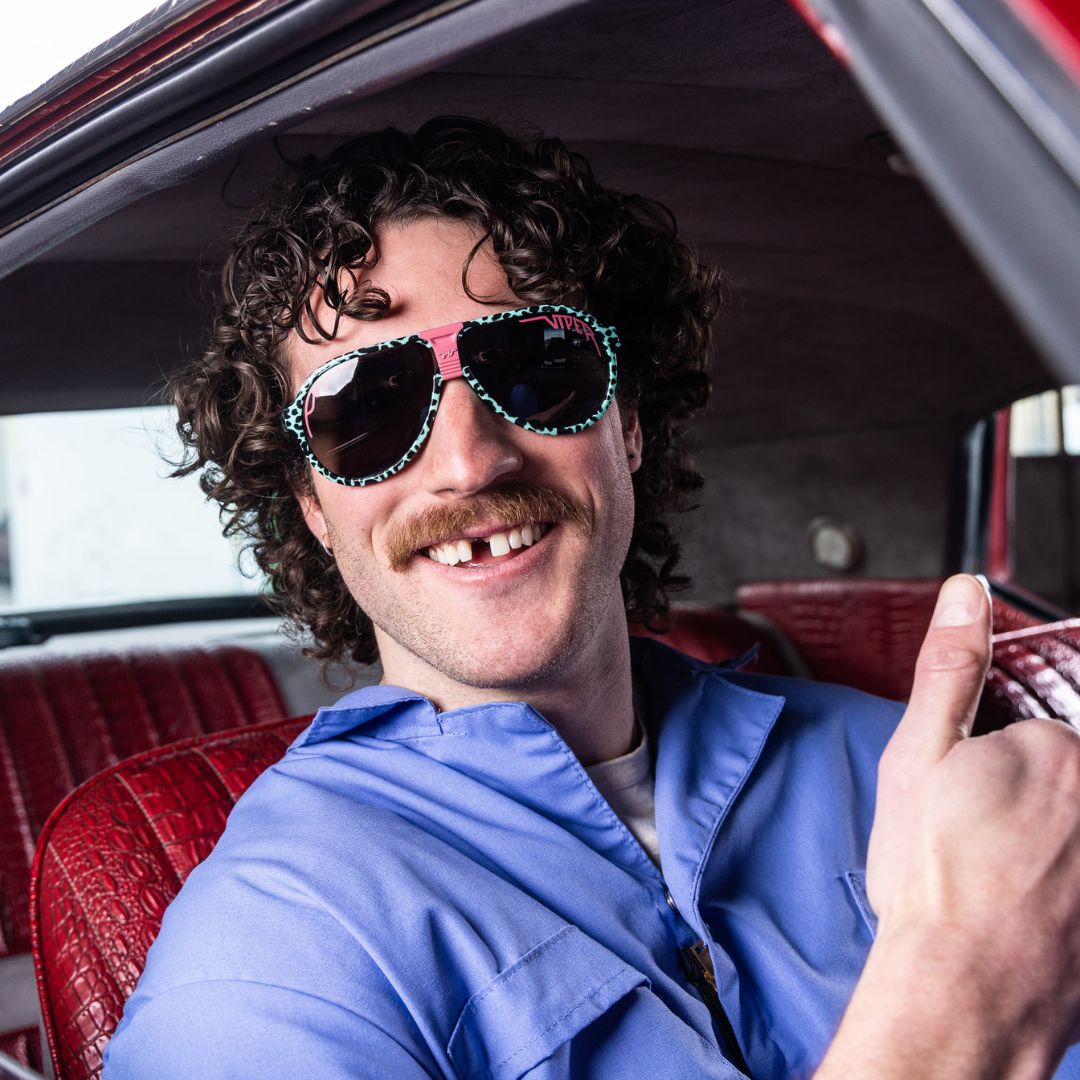 / Polarized Smoke | Man gives a thumbs up while wearing The Marissa’s Nails Jethawk with a Polarized Smoke lens from Pit Viper Sunglasses