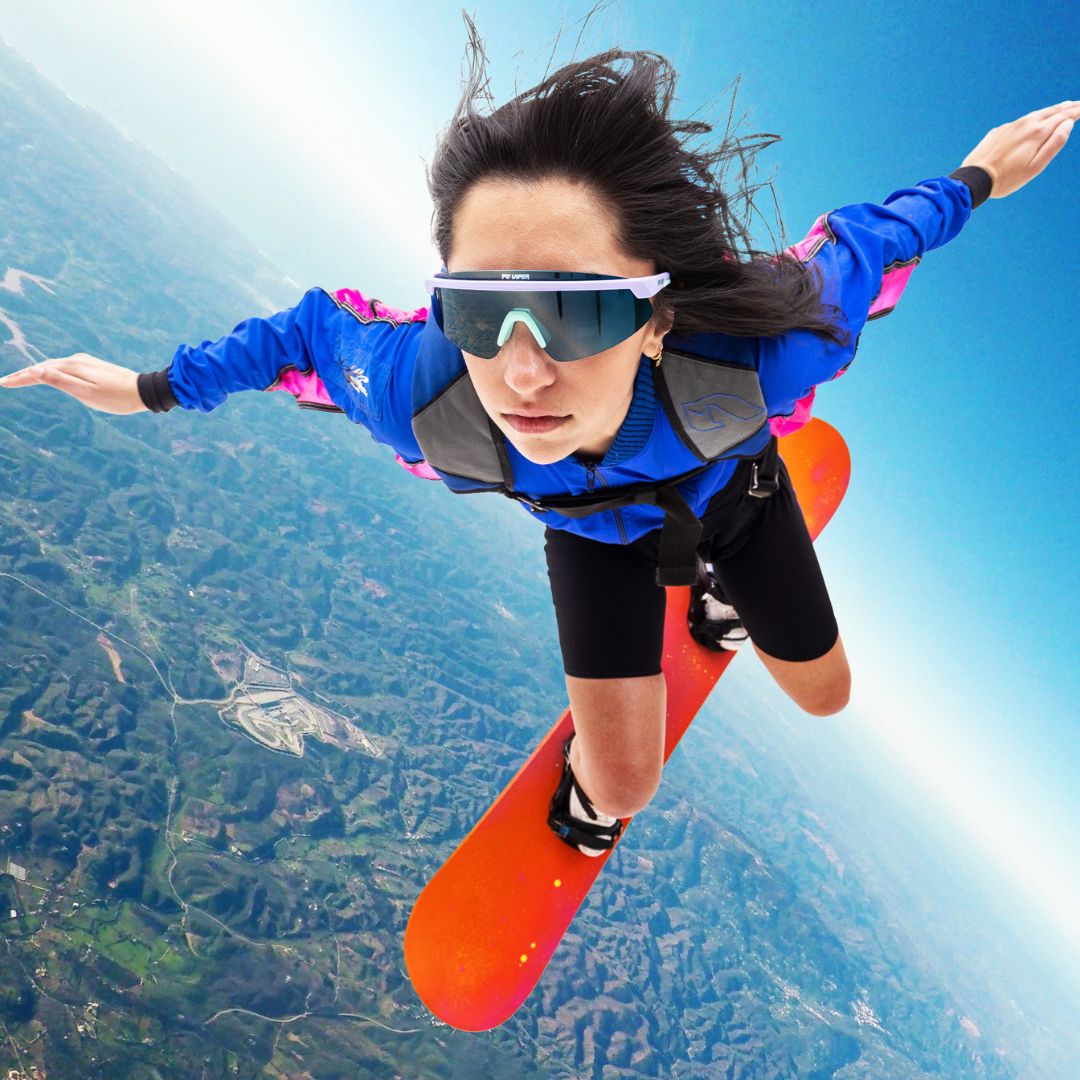 / Polarized Smoke | Person pretends to fly wearing The Moontower Skysurfer with a polarized smoke lens from Pit Viper