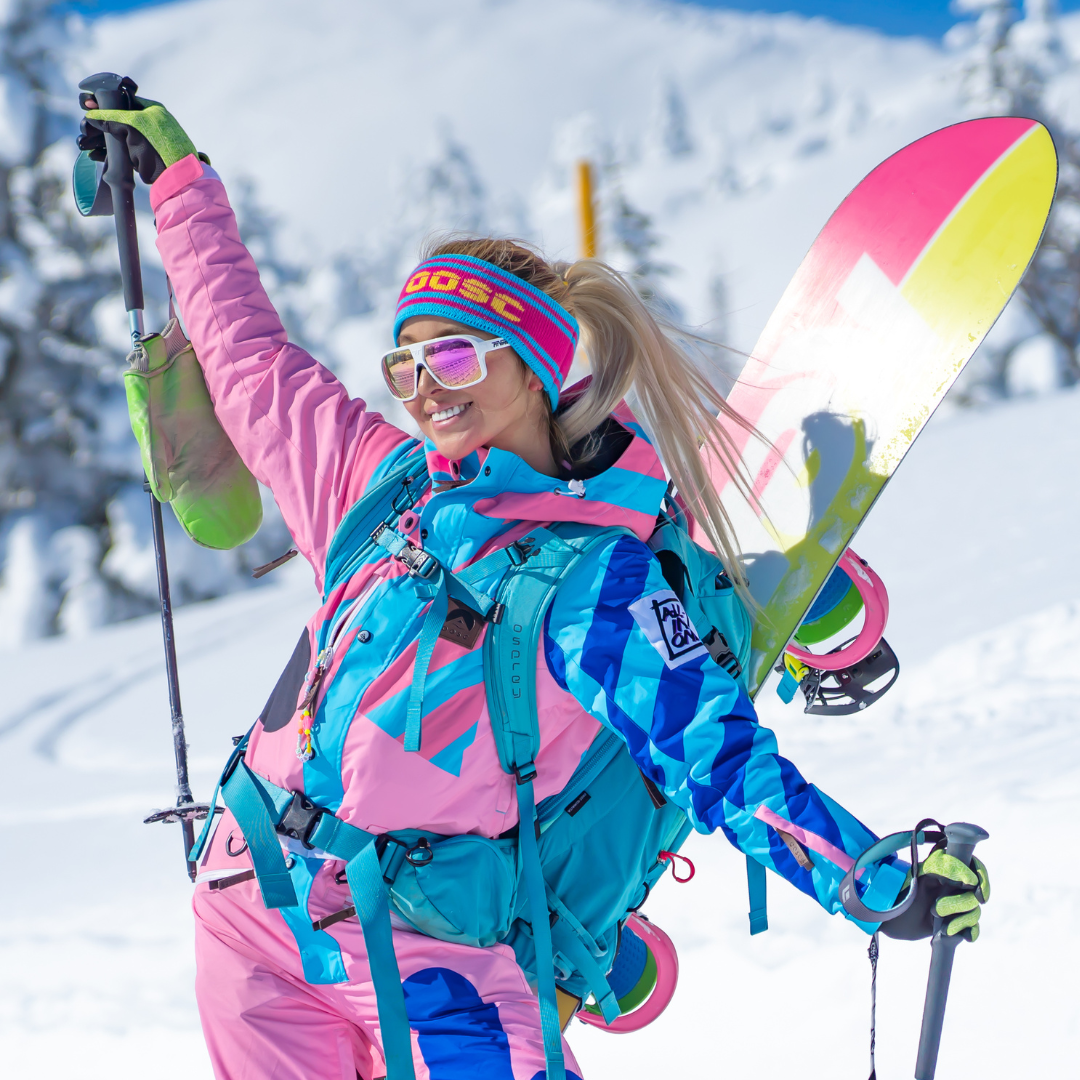 / Pink | Woman posing while skiing wearing Pit Viper Sunglasses