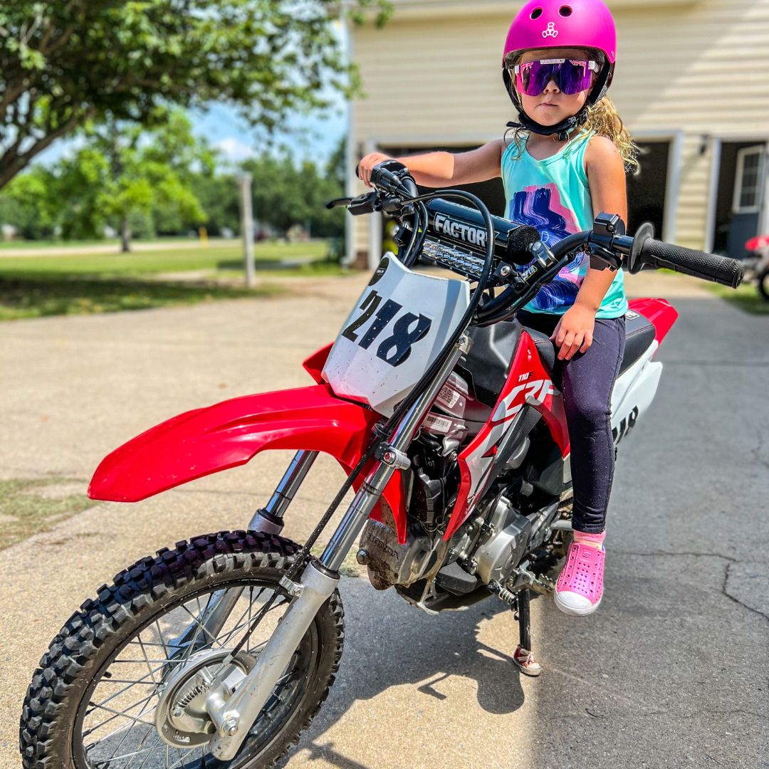 Narrow / Polarized Pink | Girl on a dirt bike wearing The LA Brights Original from Pit Viper Sunglasses