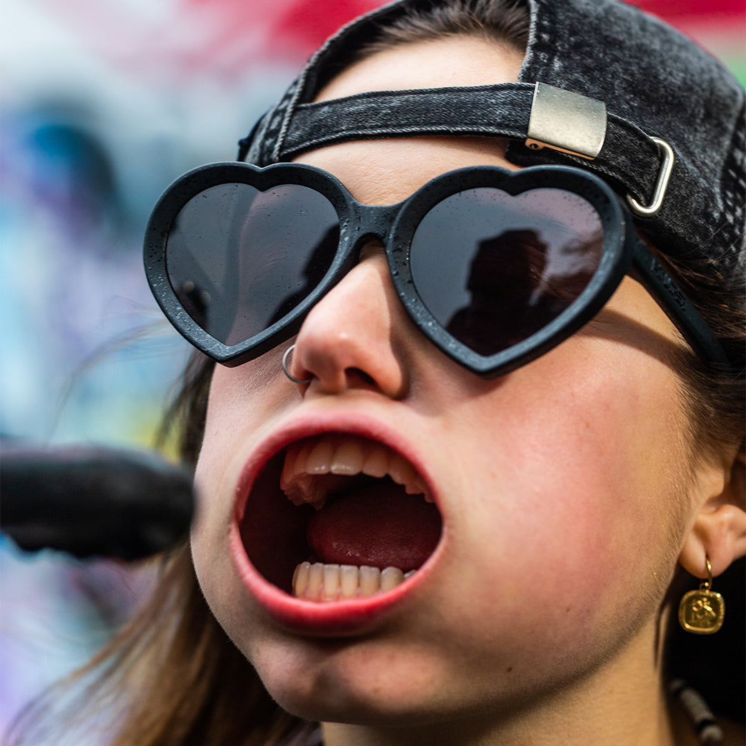 / Smoke | Woman with mouth open in the Blacking Out Admirer from Pit Viper Sunglasses