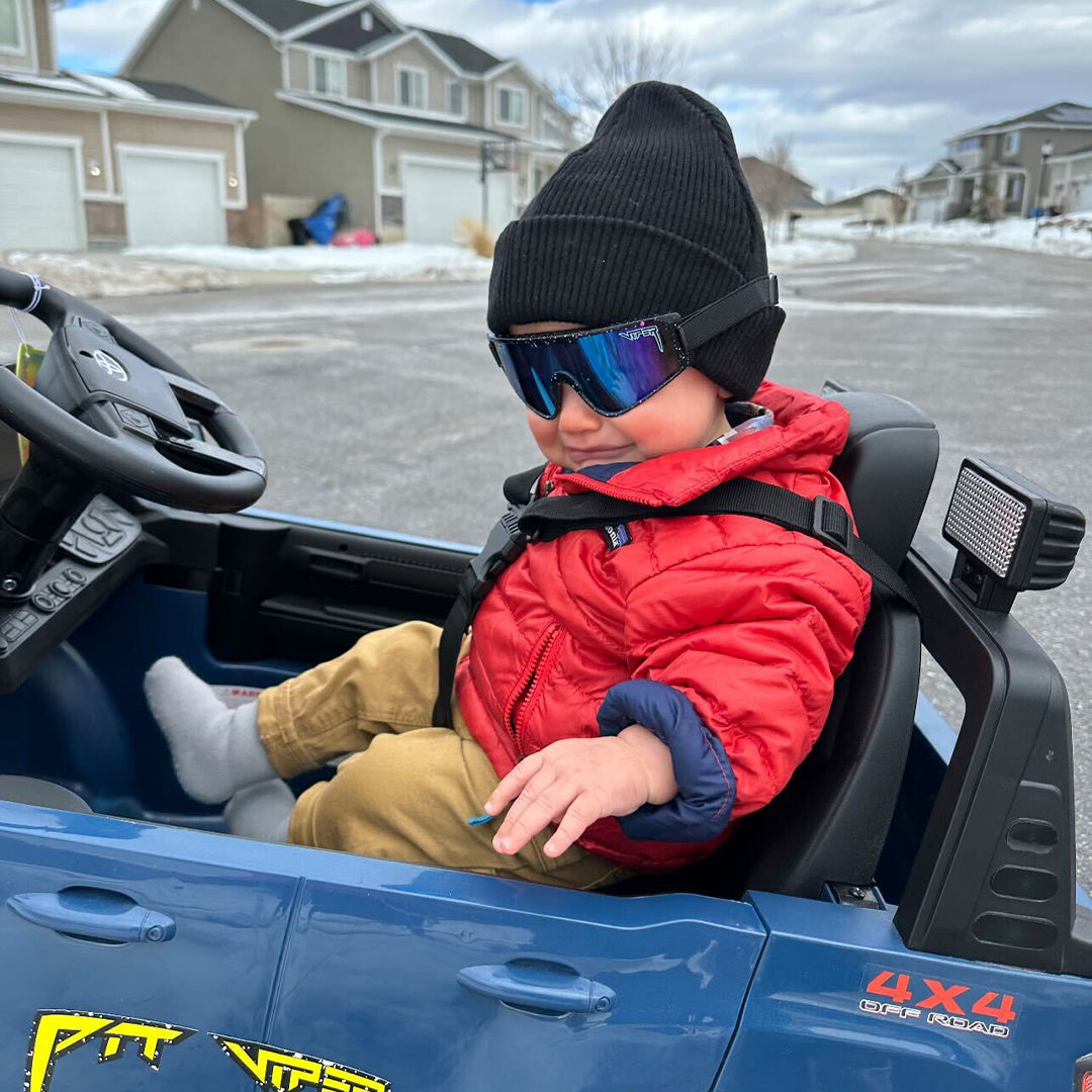 / Blue | Baby driving a kids car in The Midnight Baby Vipes from Pit Viper Sunglasses