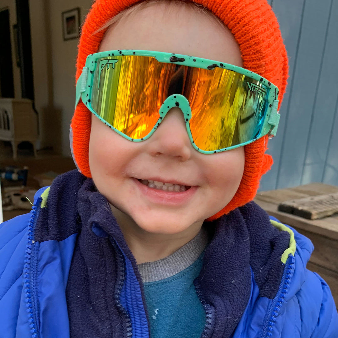 / Rainbow | Baby smiling in The Poseidon Baby Vipes from Pit Viper Sunglasses