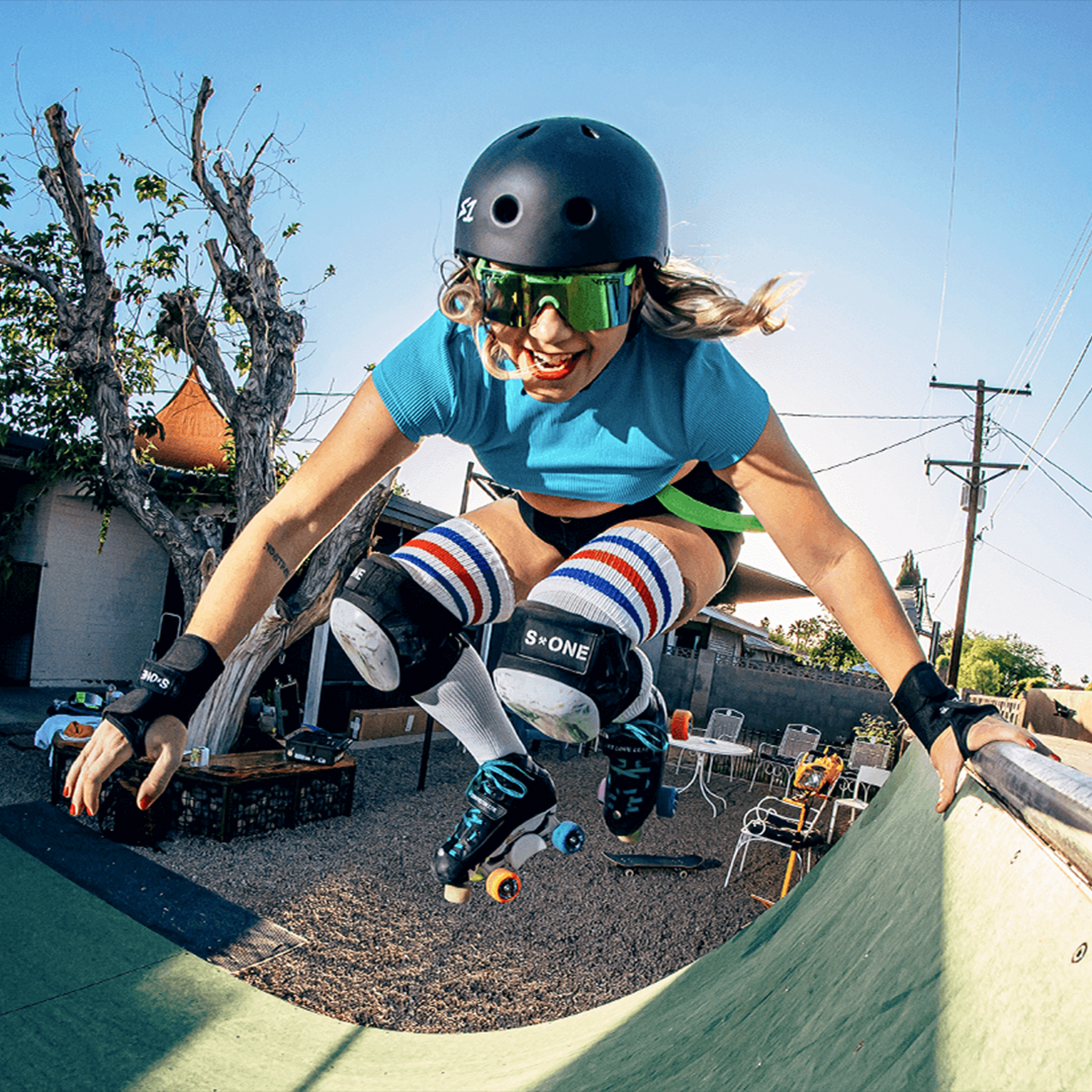 / Z87+ Orange | Woman rollerskating wearing Pit Viper Sunglasses