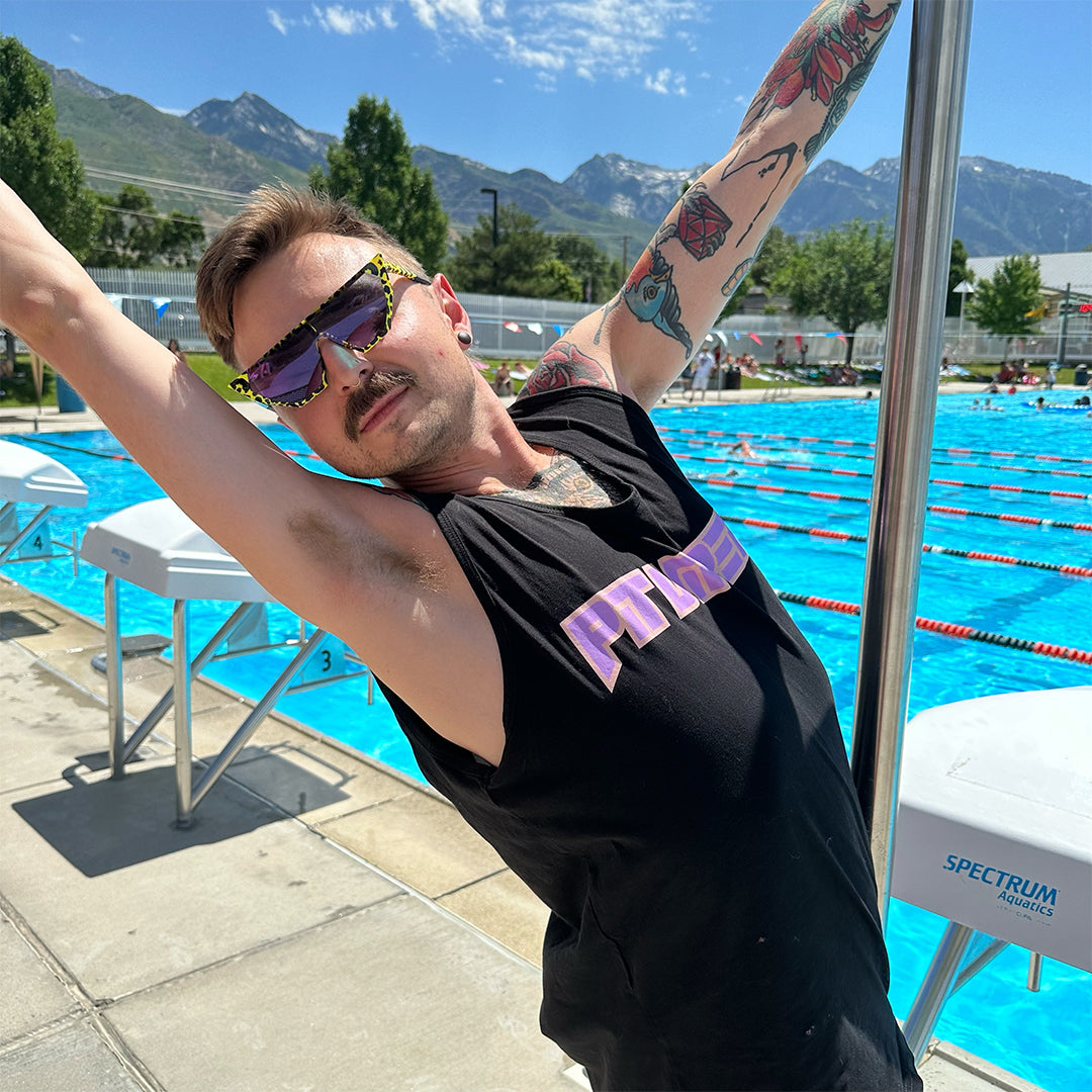 / Pink-Purple | Man at the pool wearing The Carnivore Showroom from Pit Viper Sunglasses