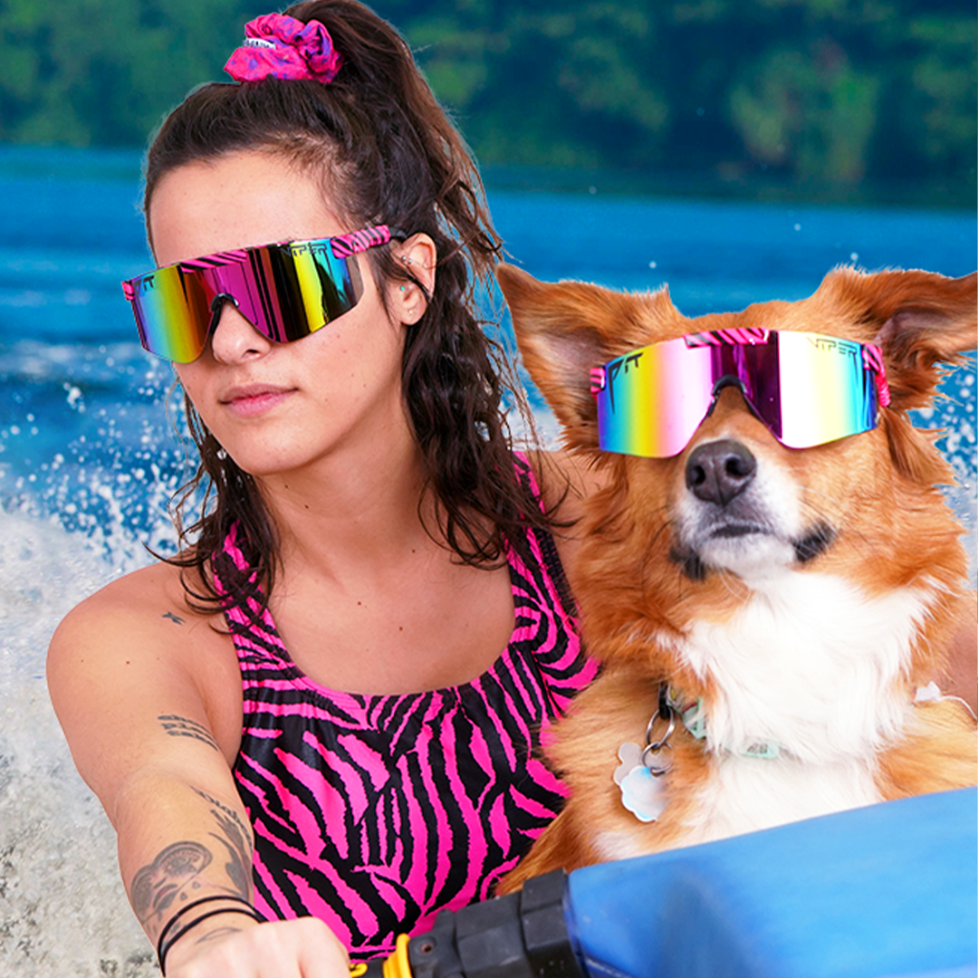 / Z87+ Rainbow | Woman on a jetski with a dog wearing Pit Viper Sunglasses