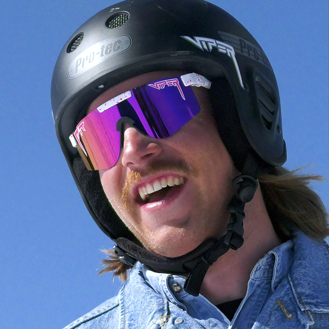 Wide / Polarized Pink | Man wearing a helmet and The LA Brights Original from Pit Viper Sunglasses