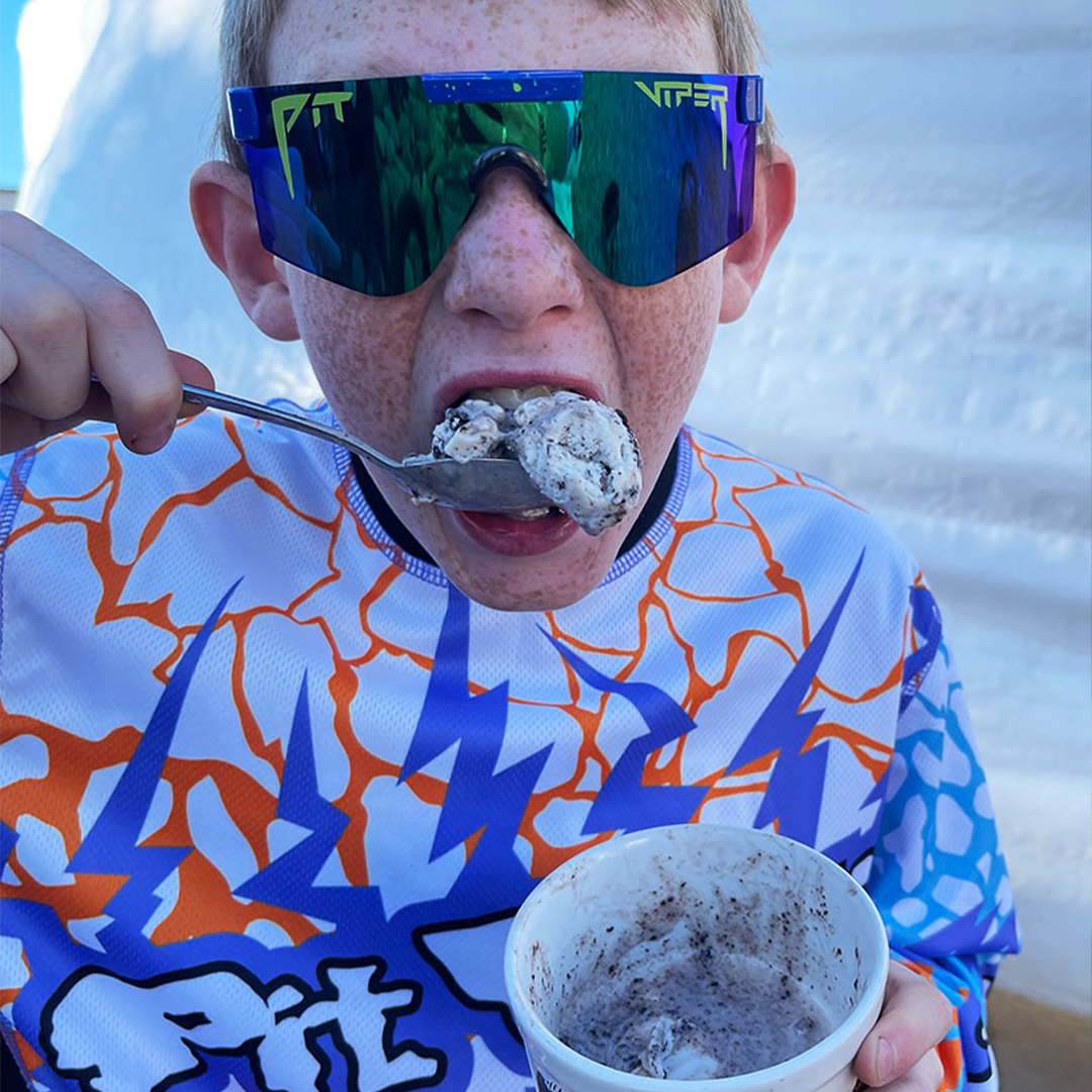 / Blue-Green | Kid eating ice cream wearing The Leonardo XS from Pit Viper Sunglasses