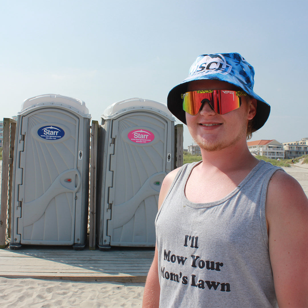 / Z87+ Red | Man smiling in front of a port-a-potty wearing Pit Viper Sunglasses