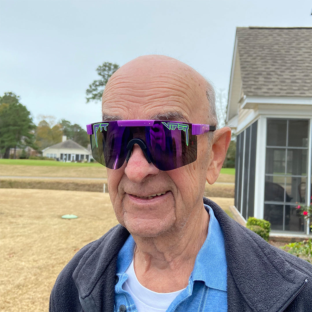 Wide / Polarized Purple | Older man smiling wearing The Donatello Original from Pit Viper Sunglasses