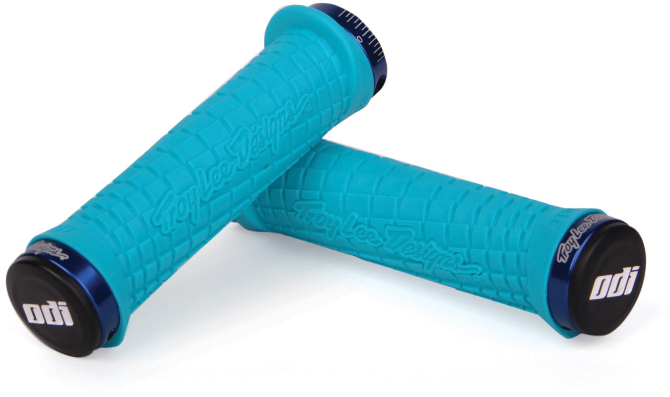 Troy Lee Designs Lock On Grips 130mm in black and blue, showcasing textured surface for improved grip and control on handlebars.