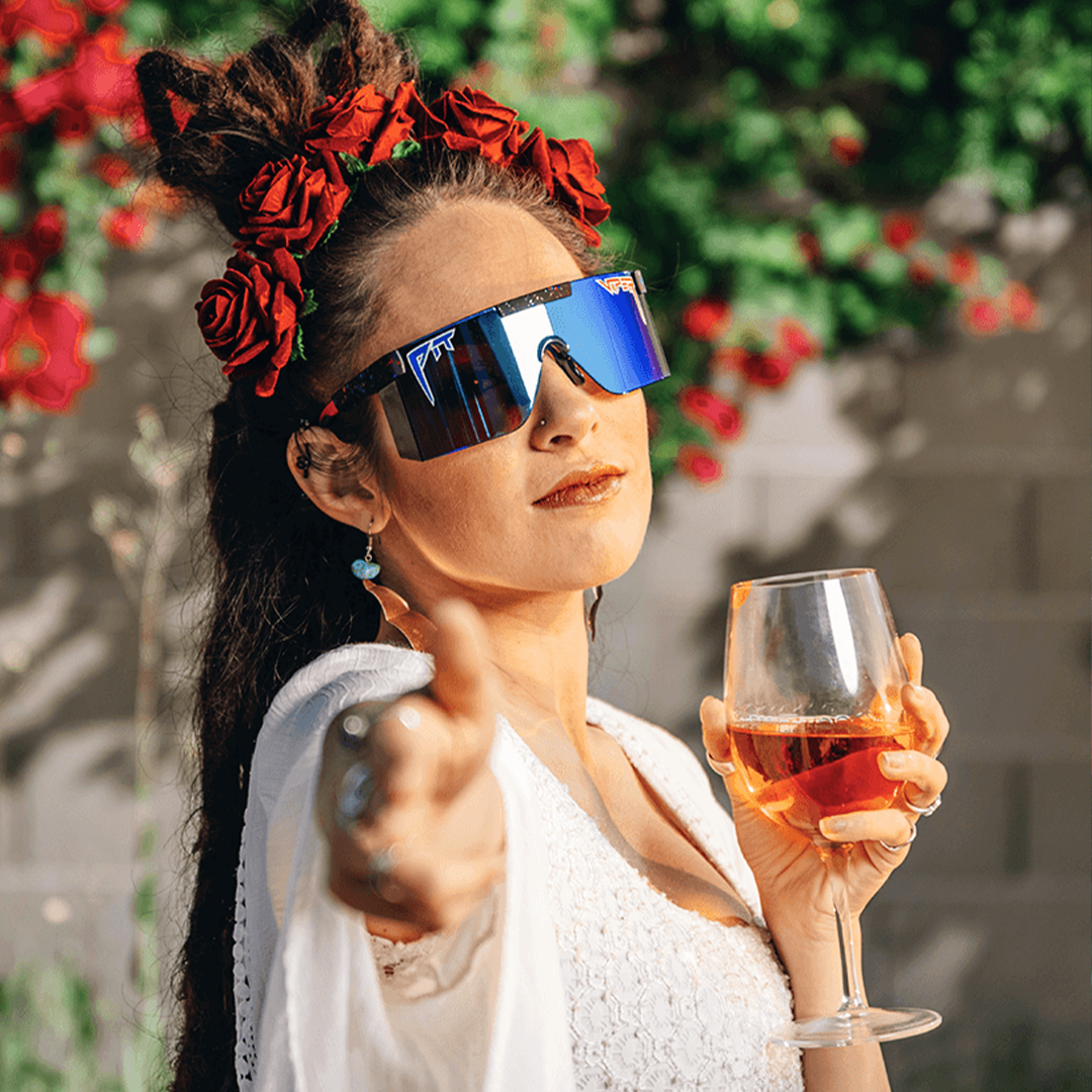 / Z87+ Blue | Woman posing wearing Pit Viper Sunglasses