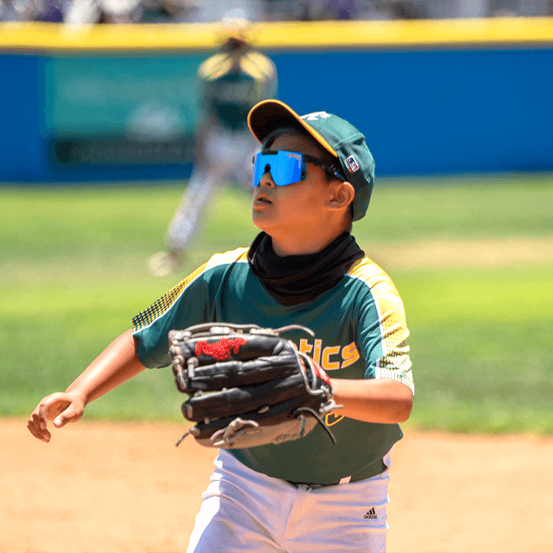 / Polarized Blue | Kid playing baseball wearing Pit Viper Sunglasses