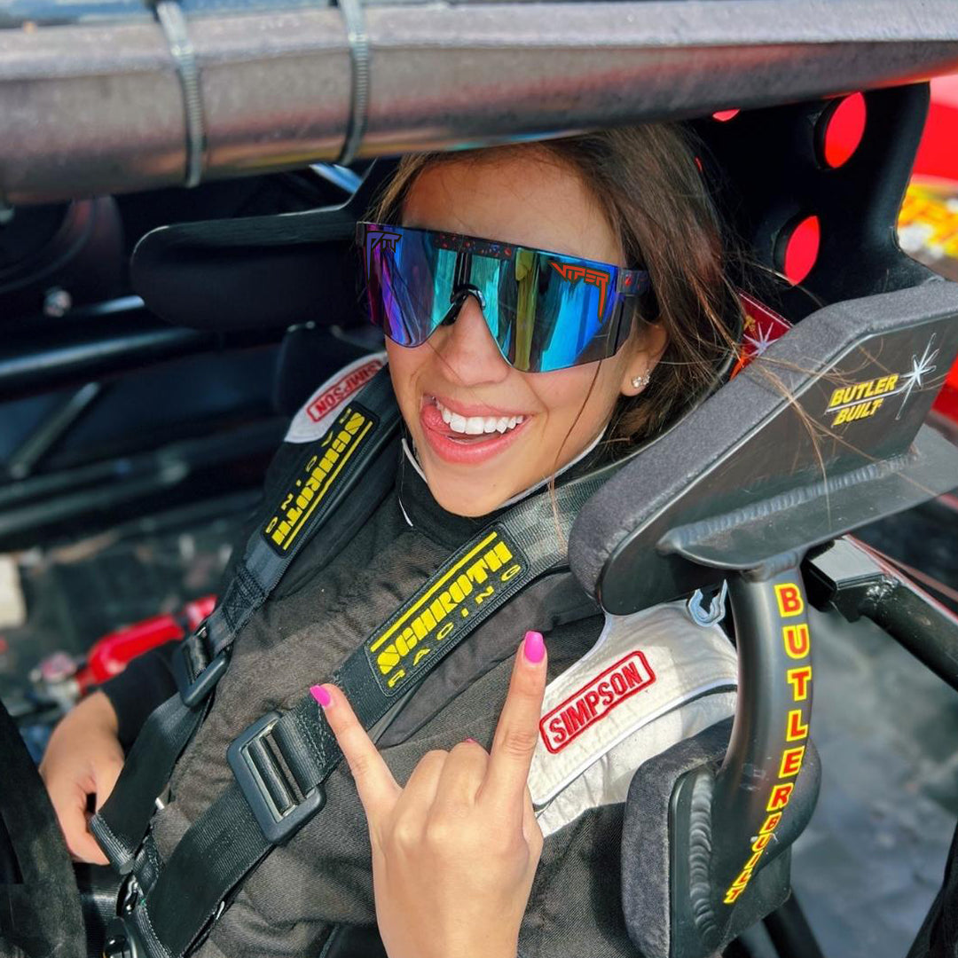 / Z87+ Blue | Woman in race car wearing  Pit Viper Sunglasses