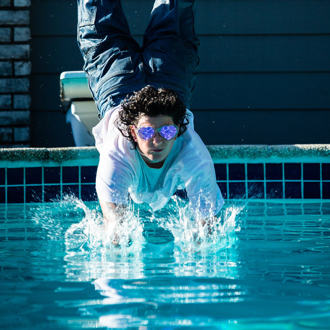 / Pink | Man diving into a pool in The Rainbow Jellies Admirer from Pit Viper Sunglasses