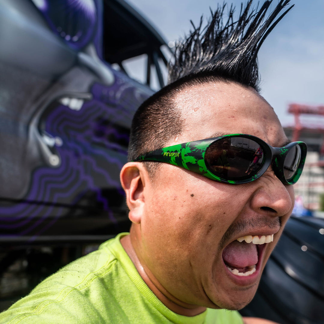 / Smoke | Man with a mohawk wearing Pit Viper Sunglasses