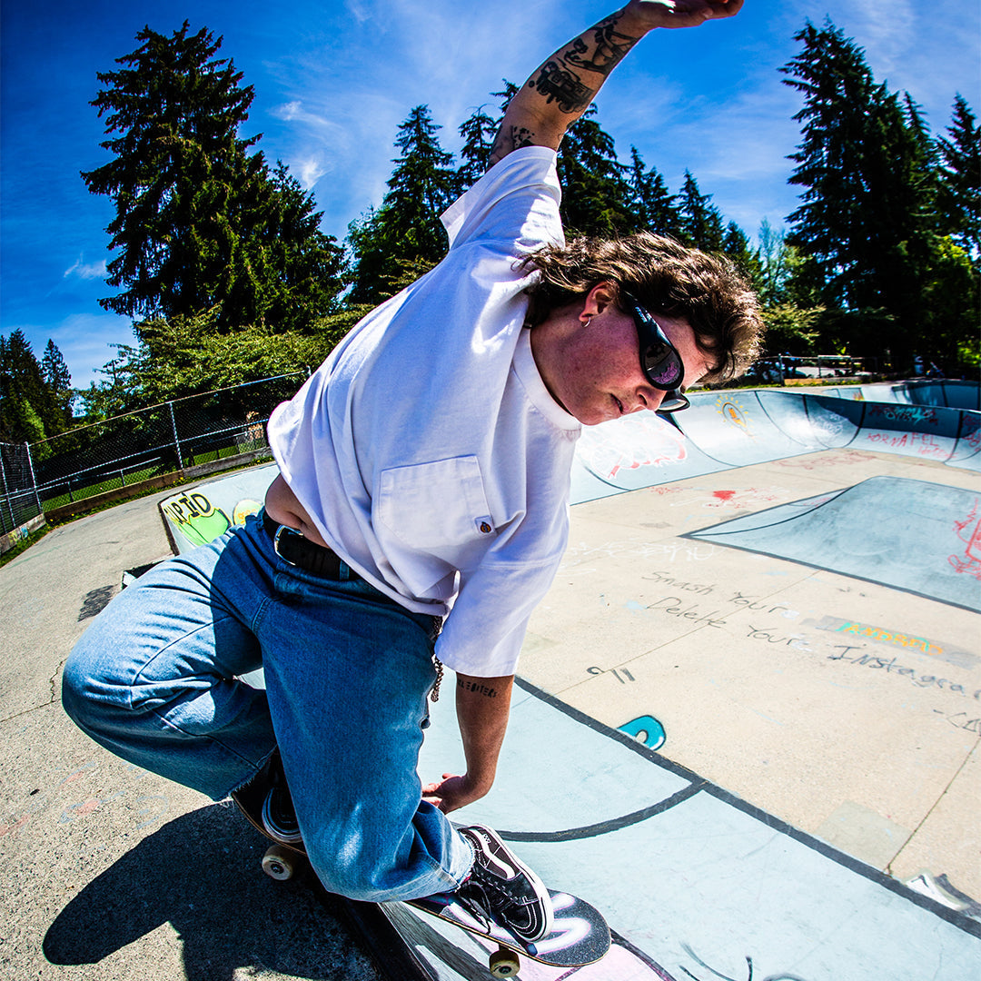 / Smoke | Woman skateboarding wearing Pit Viper Sunglasses