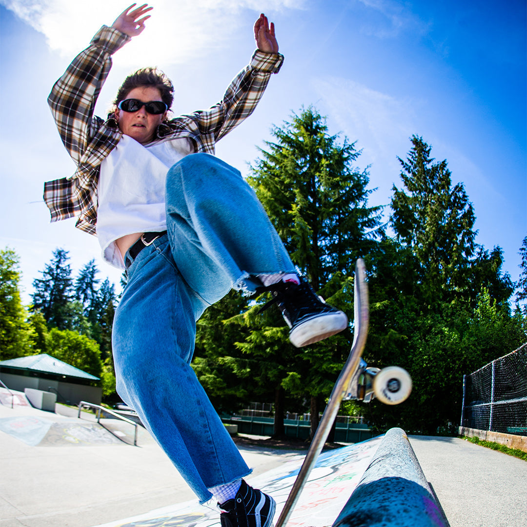 / Smoke | Woman skateboarding wearing Pit Viper Sunglasses