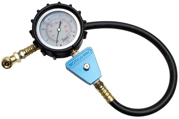 Professional tyre pressure gauge with a clear digital display and ergonomic grip.